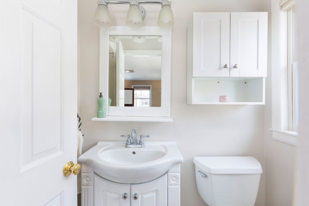 Private half bath in master bedroom of this Needham three bedroom home.